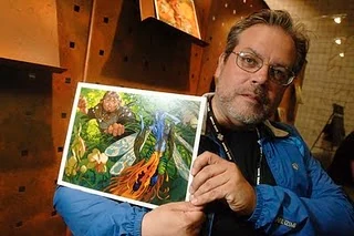 Christopher Moeller holding a print of his Magic: The Gathering painting “Sower of Temptation”